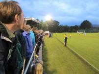 A floodlight Sandygate is filled with over 300 supporters