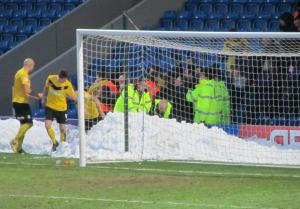 The Southend players celebrate in the snow