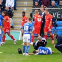 Chris Herd goes down after a late challenge from Bradley Dack
