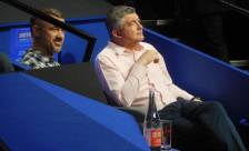 Stephen Hendry and John Parrott prepare to do a piece for the BBC