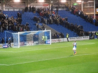 Ched Evans applauds the supporters at full time